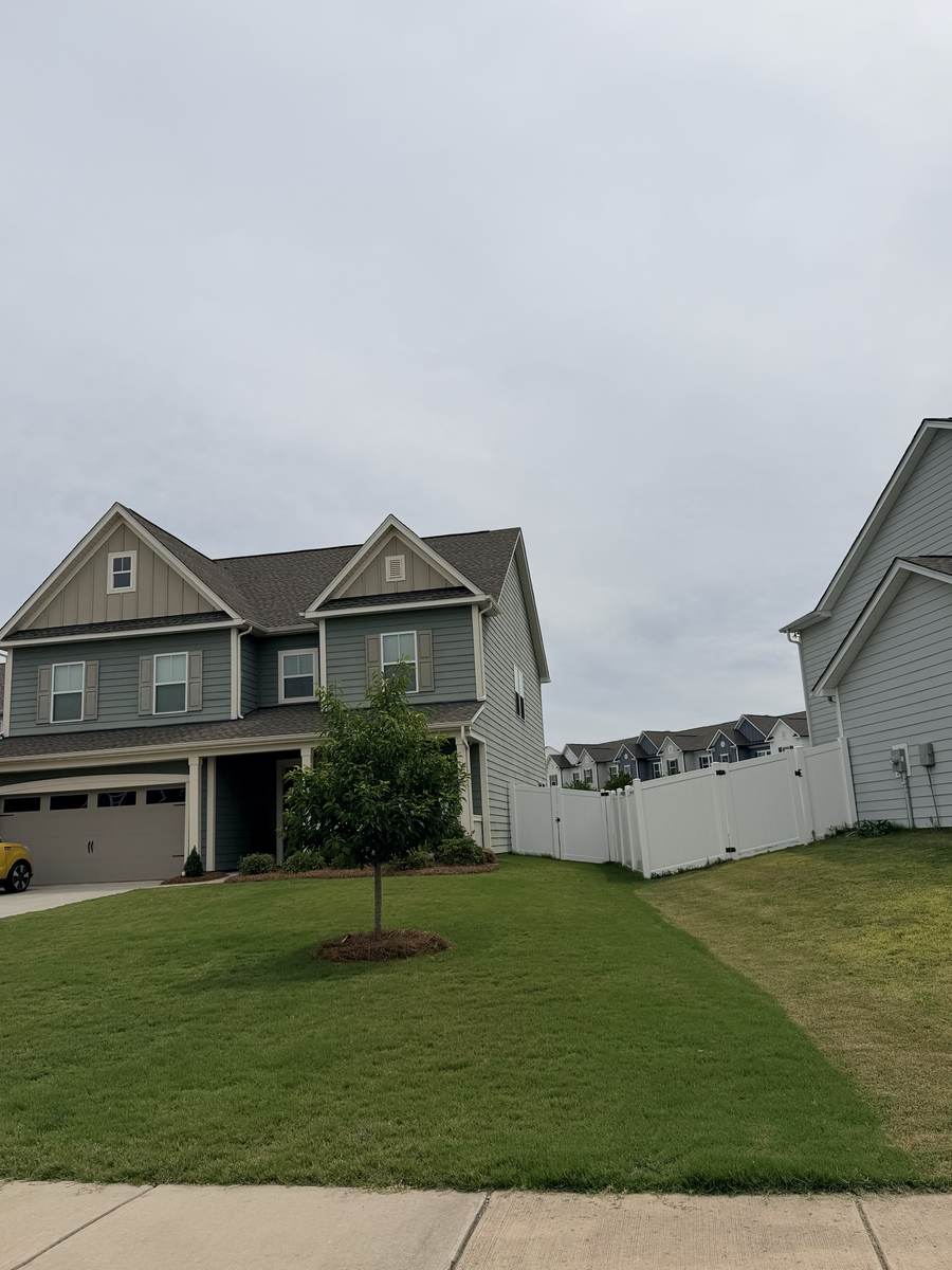 Full, healthy lawn maintained by OSO Turf Care